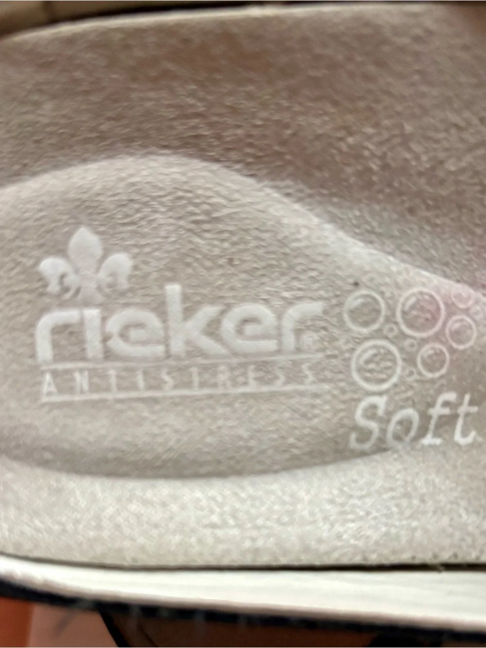 Rieker Black Slip-On Mule Loafers with Patterned Midsole